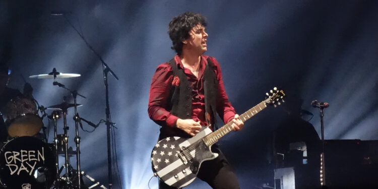 He thought he was just a face in the crowd — but Green Day had other plans. At Pinkpop Festival, a single nod from Billie Joe changed everything for 11-year-old Jules. No rehearsal. No warning. Just raw talent, one borrowed guitar… and a moment that exploded into legend. When the final chord rang out, the band gave him more than applause — they gave him the guitar. What came next left the crowd breathless… and Jules speechless: “I’m in shock.”
