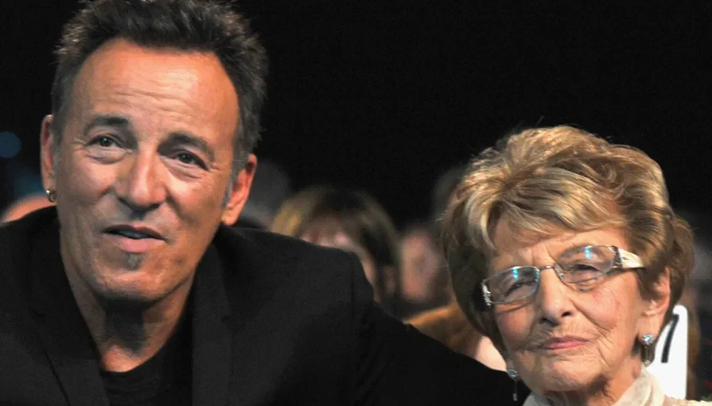 “I Remember In The Morning, Mom… Hearing Your Alarm Clock Ring.” With those first whispered words, Bruce Springsteen didn’t just sing—he opened a floodgate of memories, love, and aching loss. On The Stern Show, far from the roaring arenas and spotlighted stages, The Boss sat quietly with his guitar and delivered “The Wish”—a tribute to his late mother, Adele, so tender and personal it left the entire audience in tears. His voice trembled. His eyes glistened. And for a few sacred minutes, it wasn’t about fame or music—it was about a son remembering his mom. This wasn’t a performance. It was a love letter
