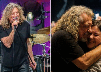 Led Zeppelin Legend Robert Plant Stops His Manchester Show After Spotting a Teen’s Handwritten Note Reading “I Just Lost My Mum – Thank You for the Music That’s Keeping Me Alive,” Bringing the Arena to Silence as He Walks to the Edge of the Stage, Takes Her Hand, Reads Her Words Aloud, and Signals His Band for a Change No One Saw Coming